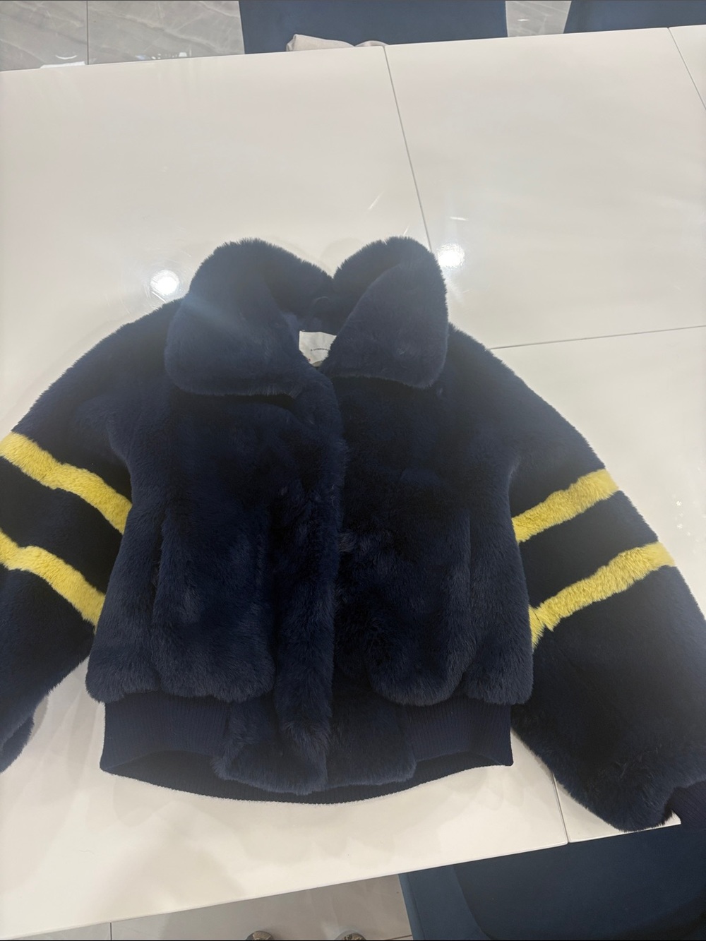 Anthropologie women size extra small ( runs big)Navy Fur Jacket